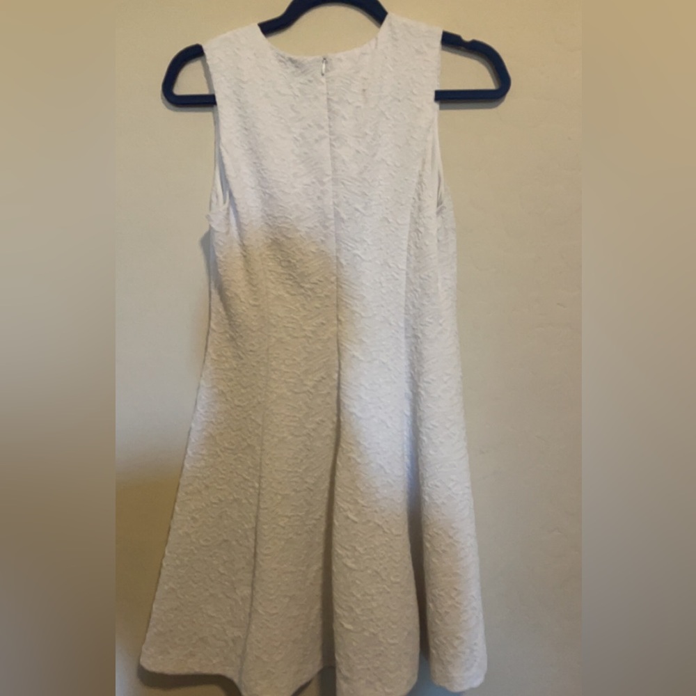 Medium Forever 21 sleeveless white dress.